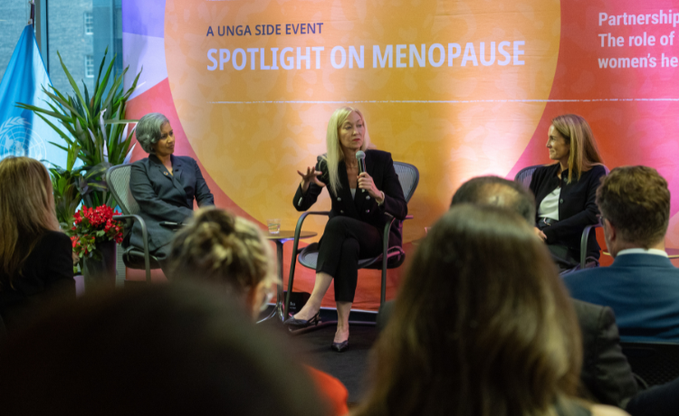 Three panelists delivering remarks during the UN General Assembly side event on menopause-friendly workplace policies