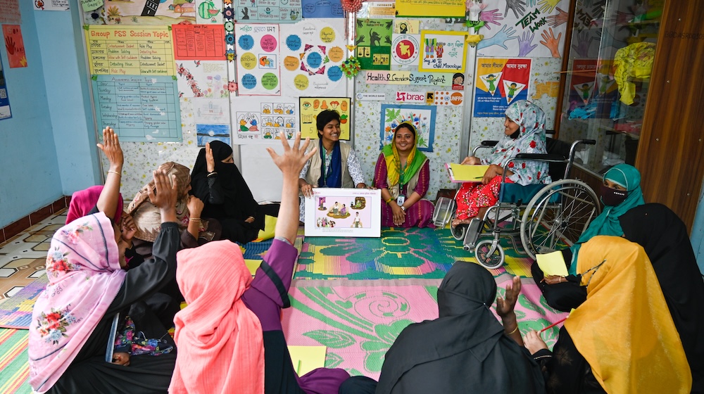 A group of women sitting together in a classroom