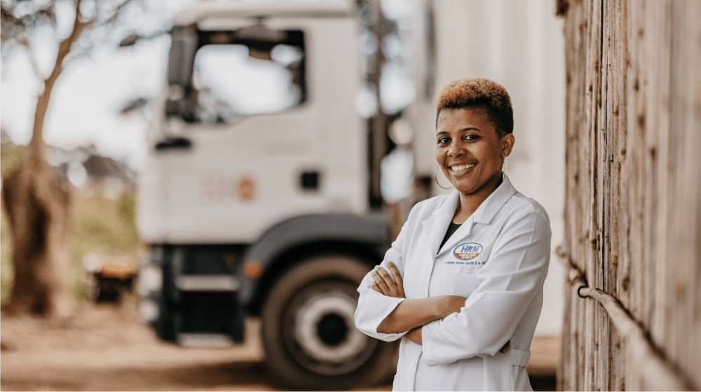Health care professional in front on UNFPA mobile clinic