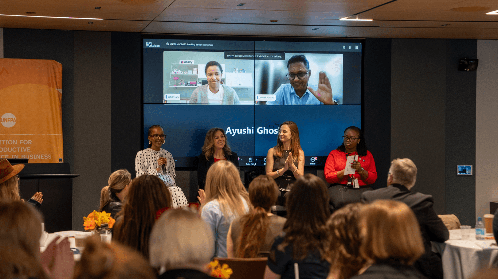 Speakers at the UNFPA side event at CSW70. From left to right: Shudufhadzo Musida, Jennifer Herrera, Eva Fernandez Martin, Jane Nyanjom, Sahil Tesfu, (on screen) and Deepak Rautela, (on screen) ©UNFPA/Sarah Bellingham 