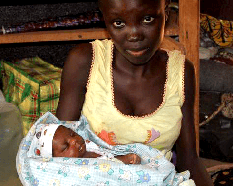 Woman and baby in Central African Republic A young woman holds her infant son.