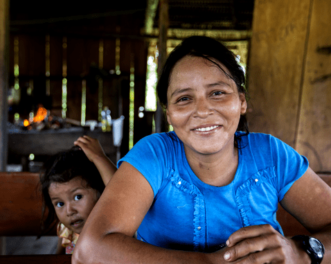 Woman and child in Ecuador A woman and her young daughter in their home.