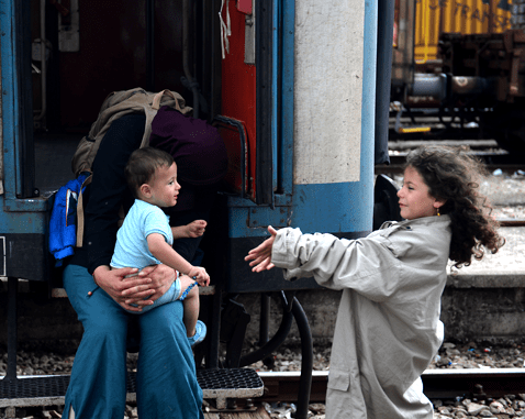 Syrian family in North Macedonia A Syrian family at a train yard.