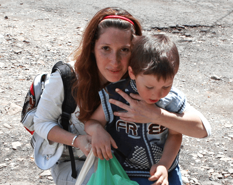 Mother and child in Ukraine A woman and her son.