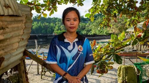  The photo shows Jenine Ortiz counselling a young mother in an office