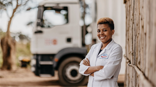 Health care professional in front on UNFPA mobile clinic