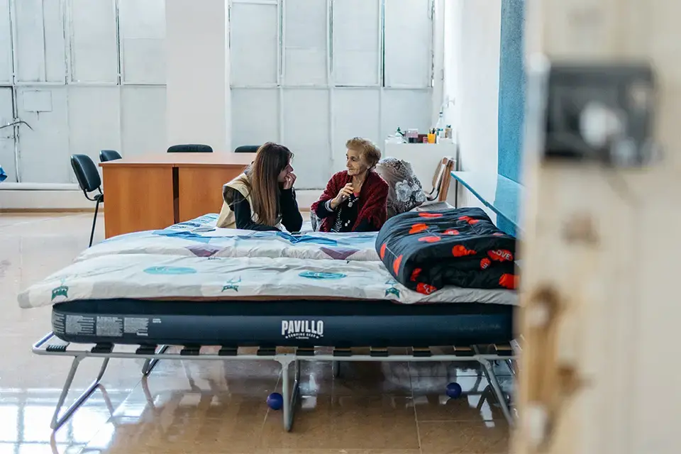 Lena, 74, says all she wants is “home, in a safe place, so we don't have to move again.” 