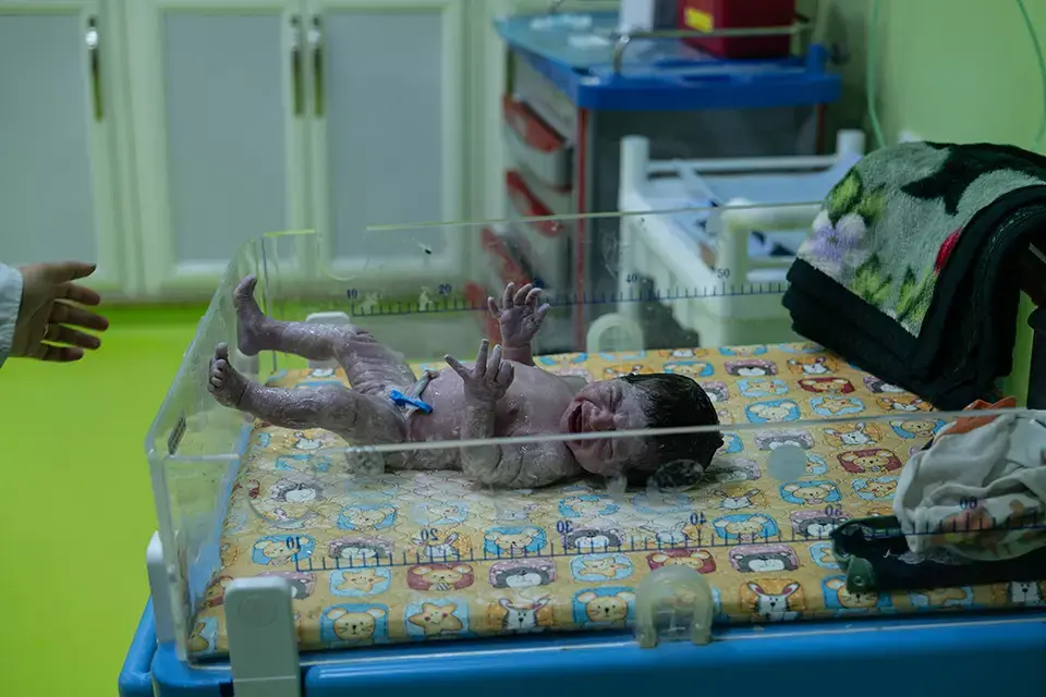 A newborn at a maternity ward supported by UNFPA in Umar Al Mukhtar.